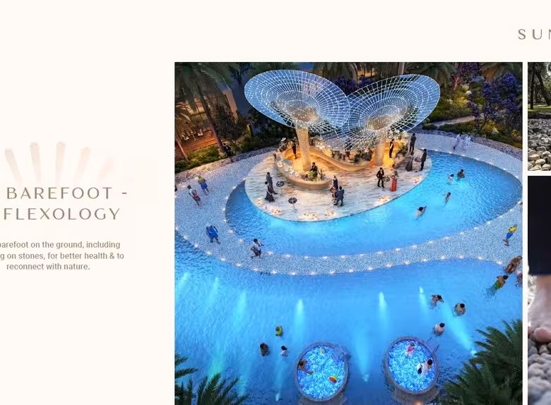 Aerial view of people enjoying reflexology walk in sparkling pool.